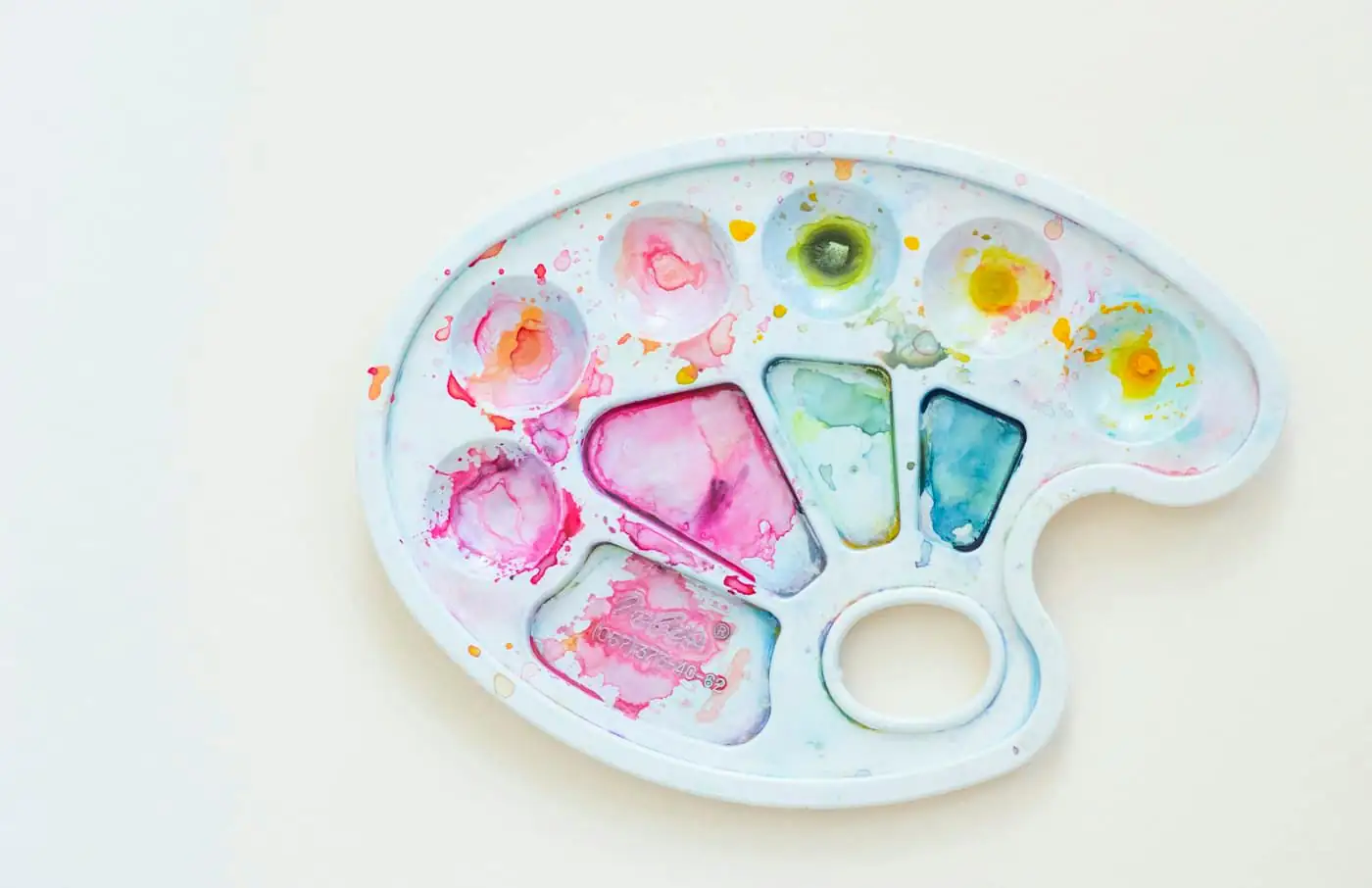 A watercolour paint palette in the art studio